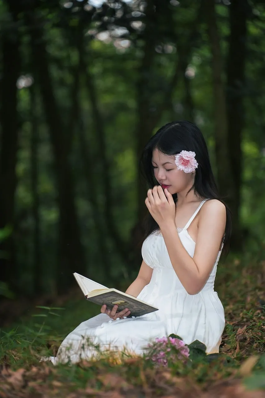 Serene Forest Reading: Woman in White with Pink Rose