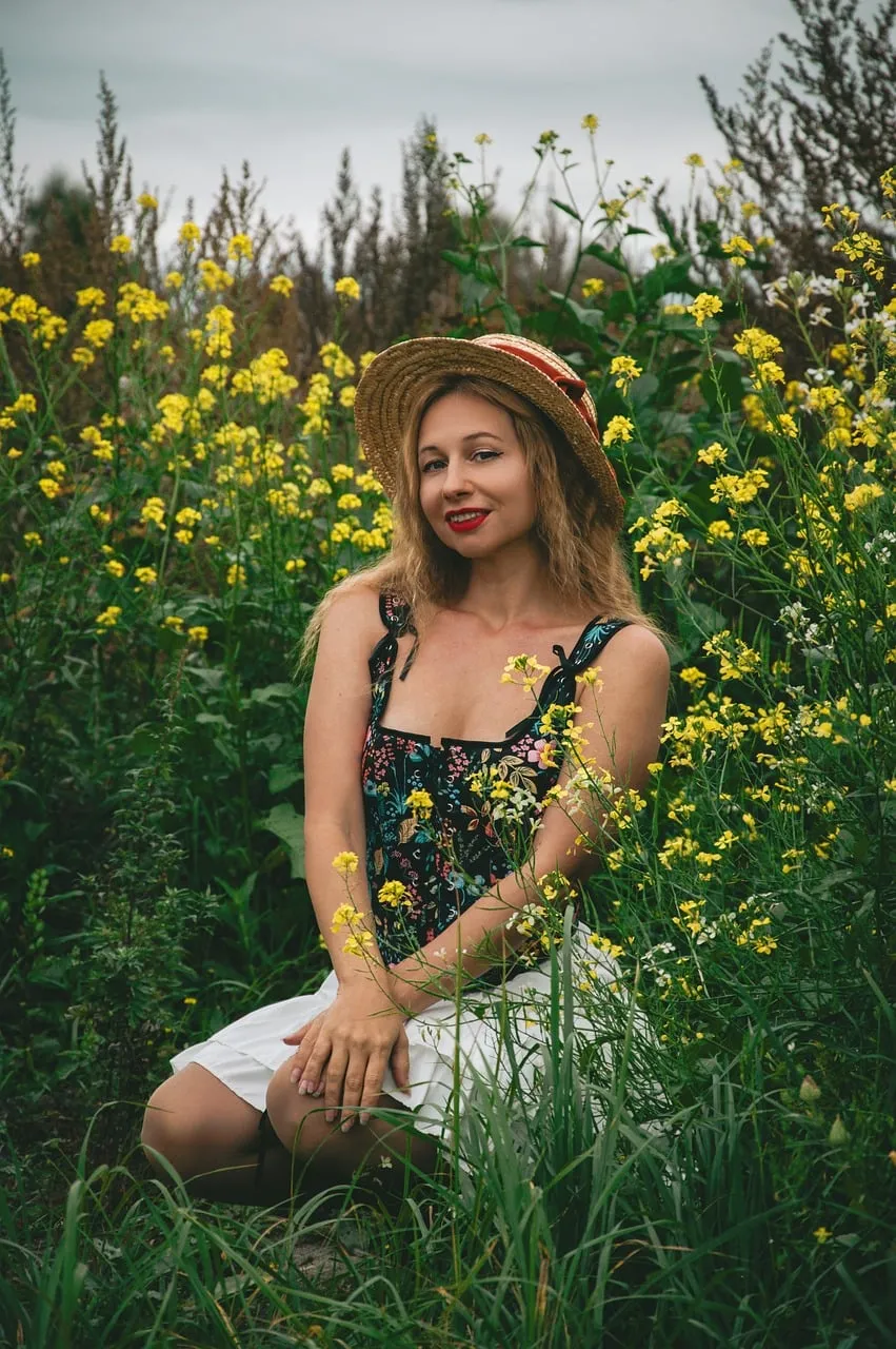 Stunning Summer Bloom: Woman in Field of Yellow Flowers
