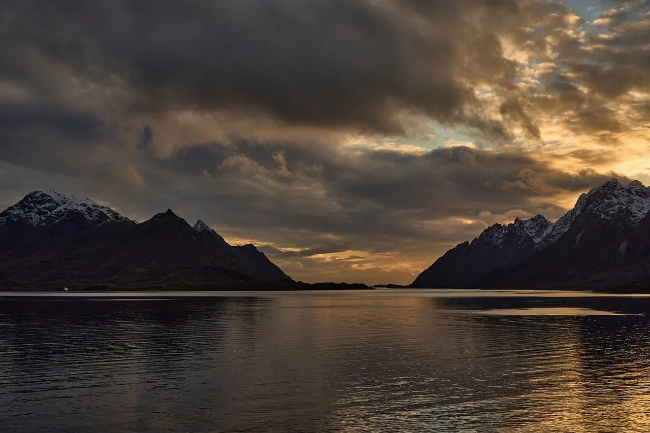 Dramatic Nordic Sunset Over Calm Bay