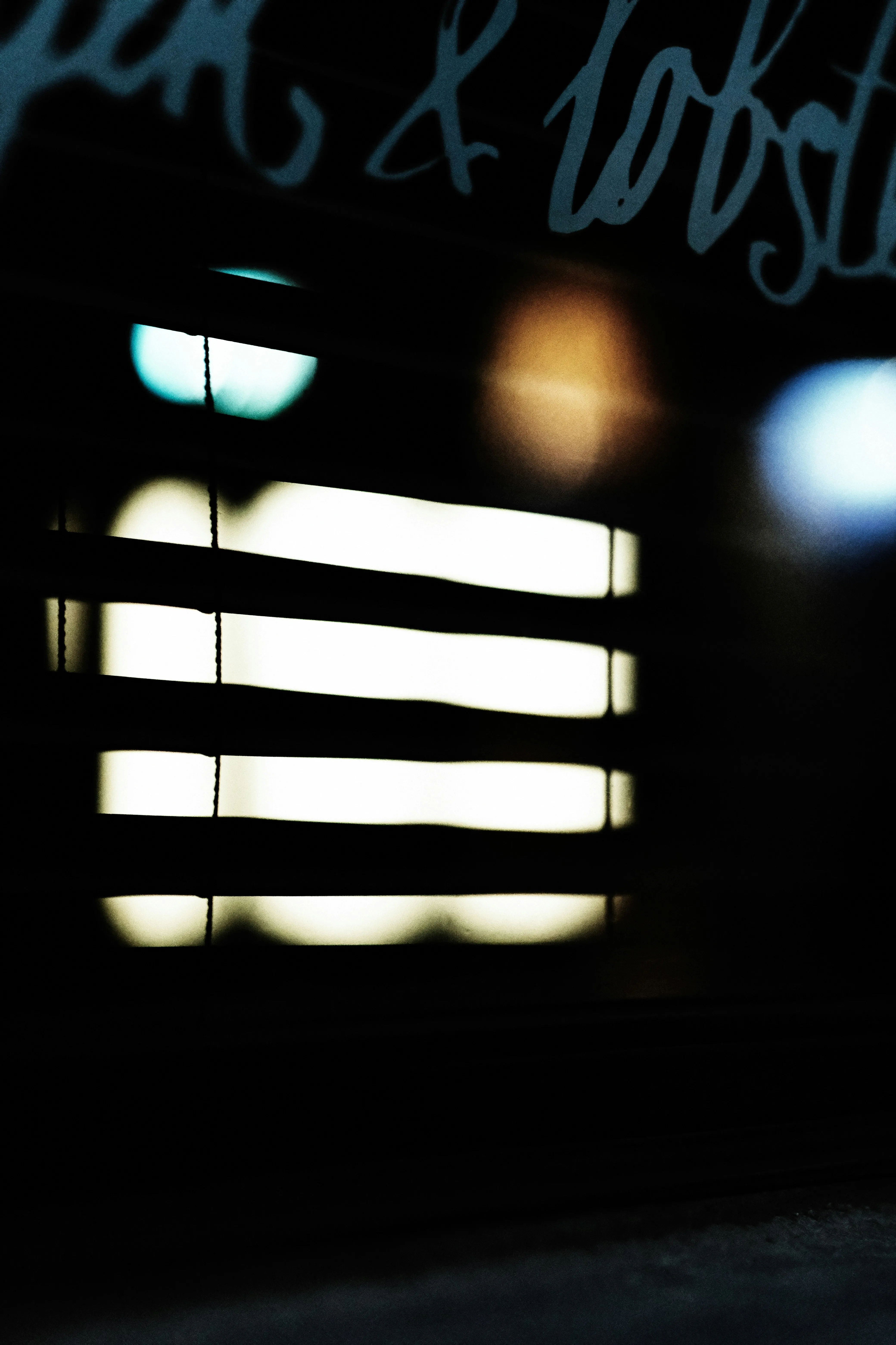 Abstract Night: Blinds, Light, and Urban Mystery