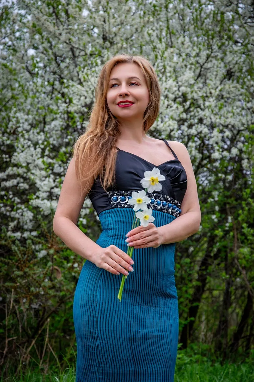 Stunning Spring Beauty: Woman with Daffodils in Bloom