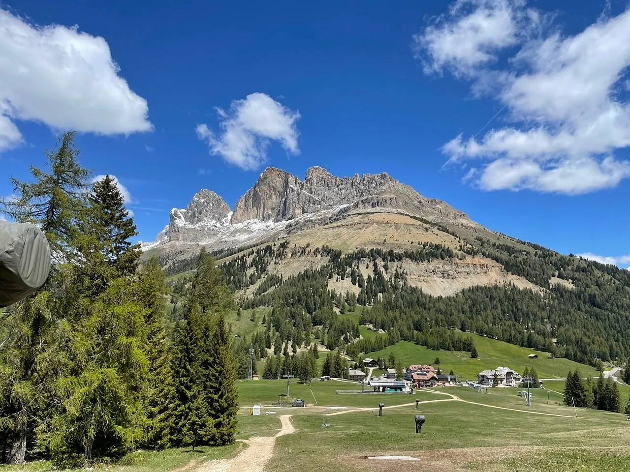 Breathtaking Dolomites Vista: Majestic Peaks Under Summer Skies