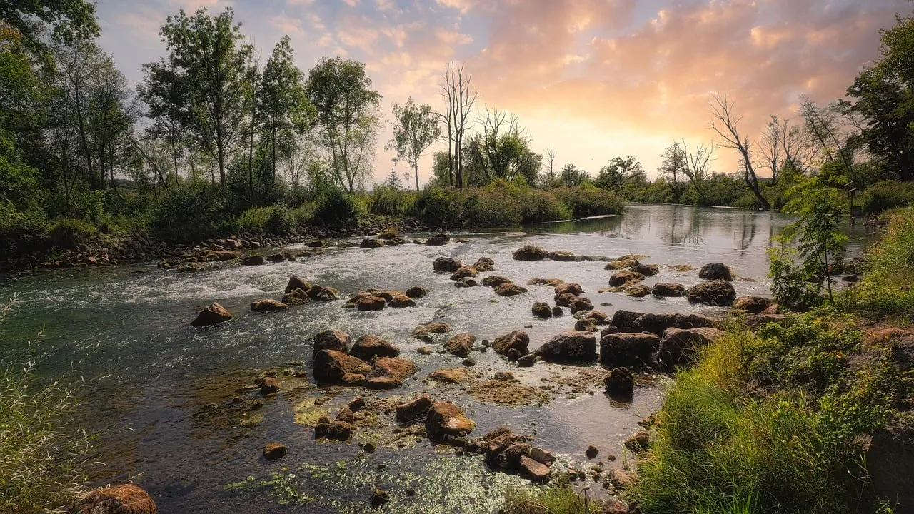 Breathtaking Sunset Over Serene River Landscape