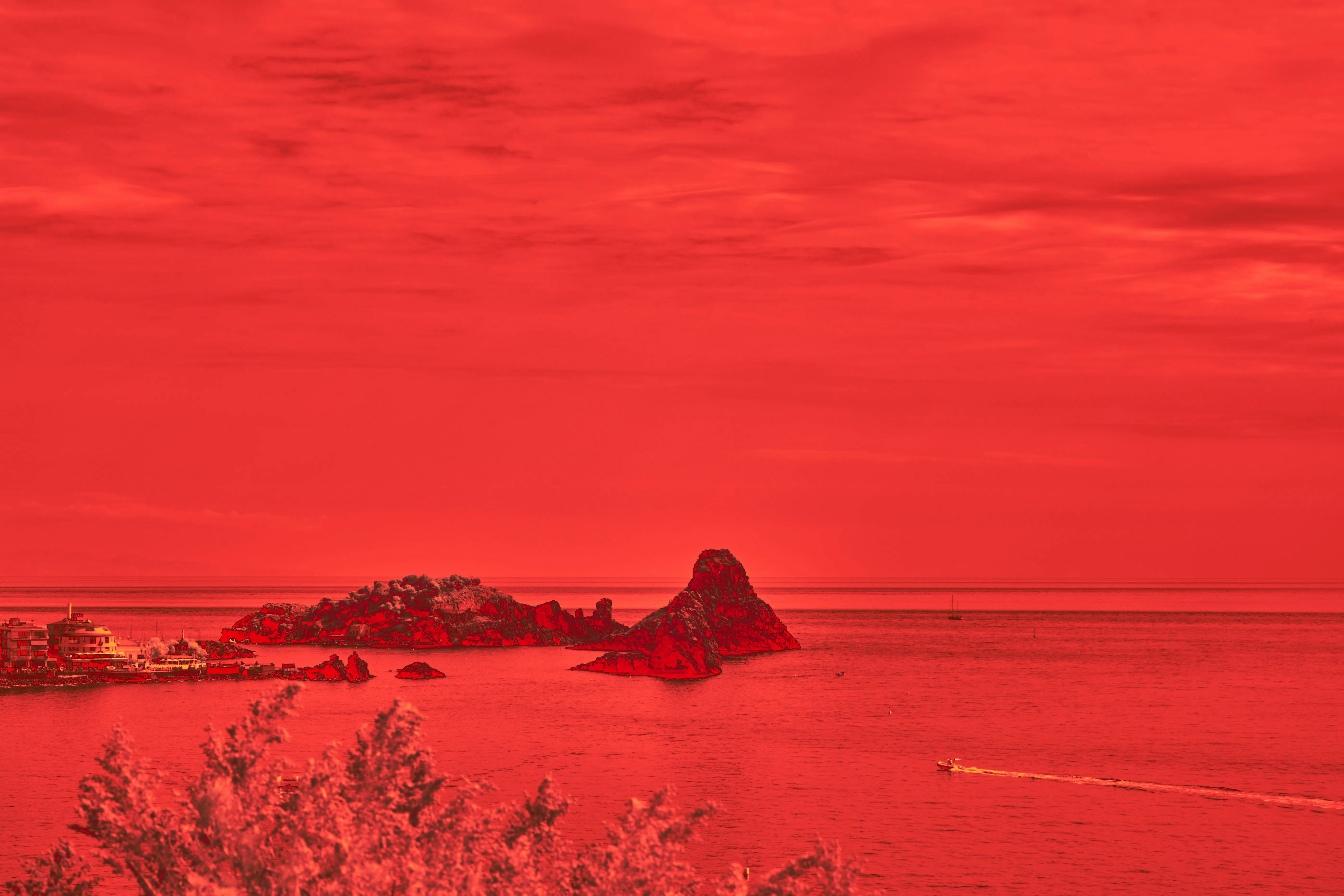 Dramatic Crimson Seascape: Rocky Isles and Distant Boat