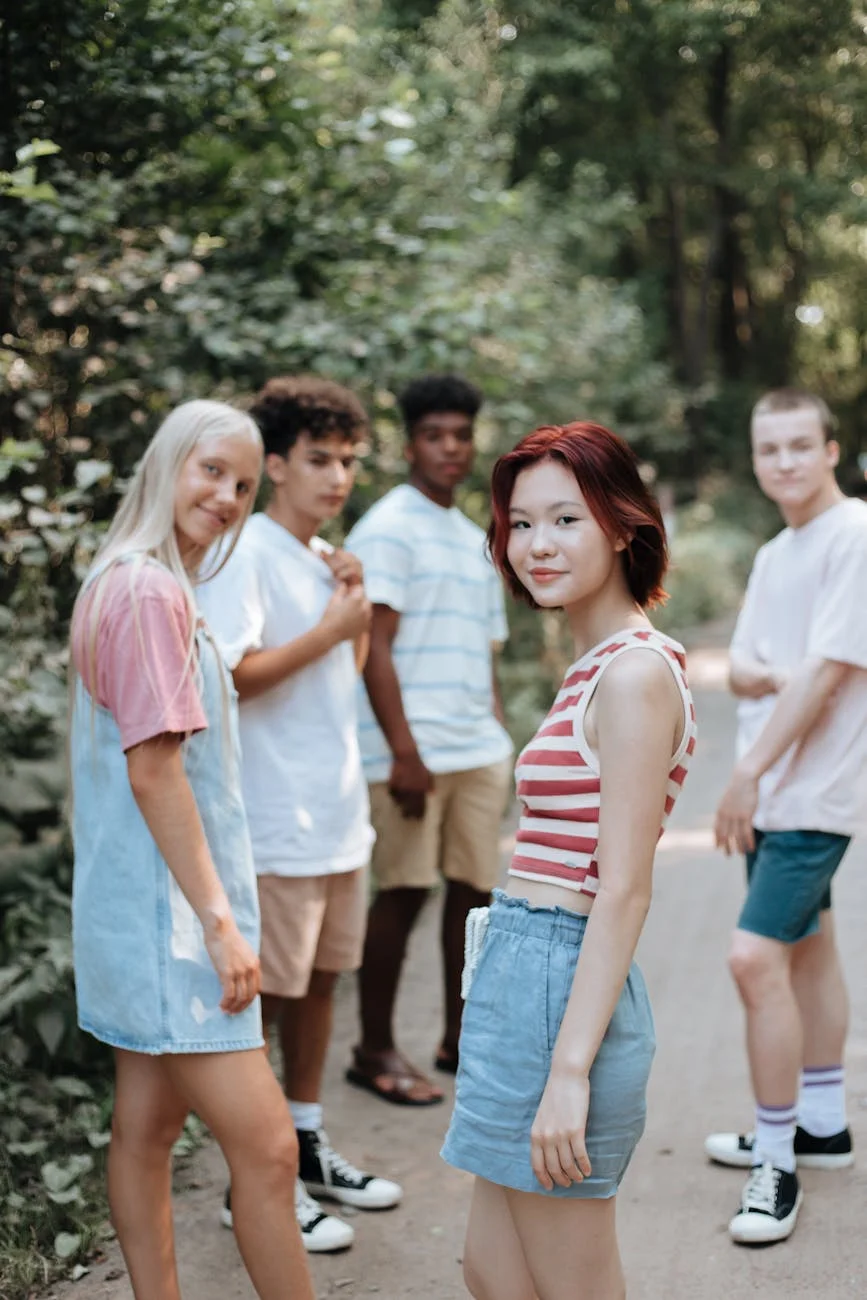 Vibrant Youthful Gathering: Diverse Teens Enjoying Nature's Embrace