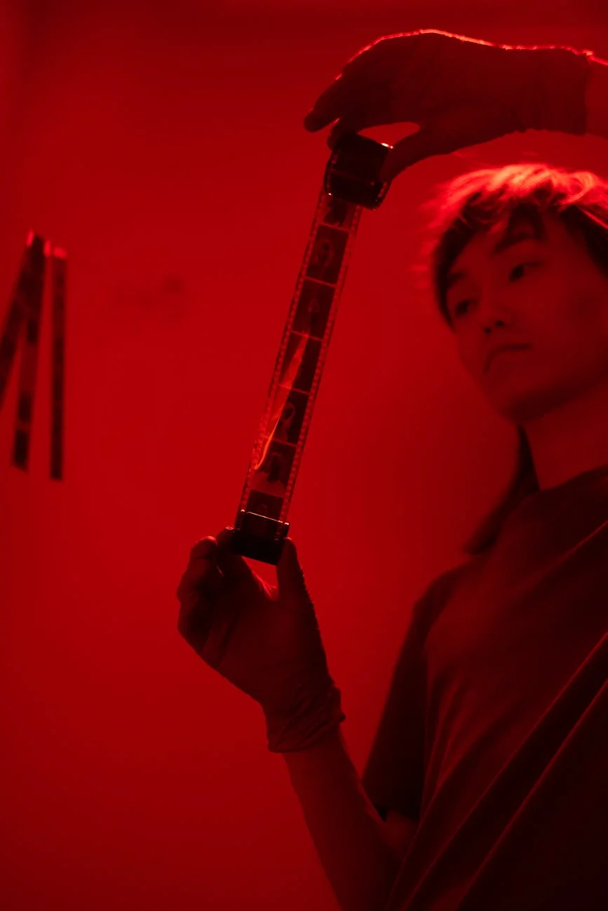 Red Light Darkroom: Developing Film's Hidden Artistry