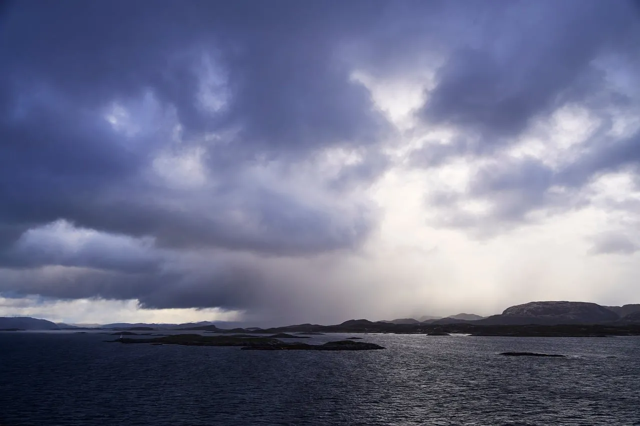 Dramatic Dawn: Hope Amidst a Stormy Sea Landscape