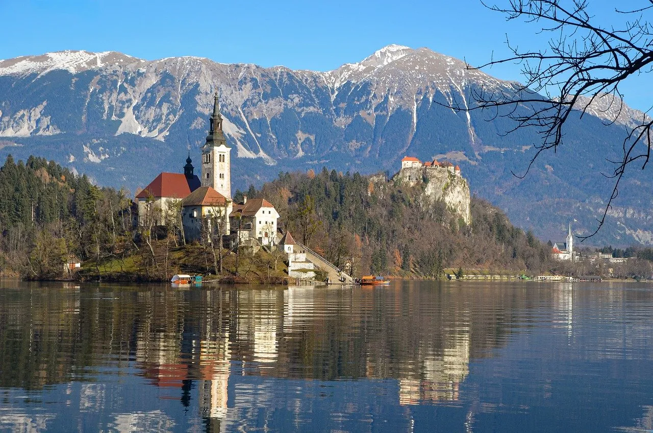 Breathtaking Bled: Iconic Castle & Church Reflect on Serene Lake