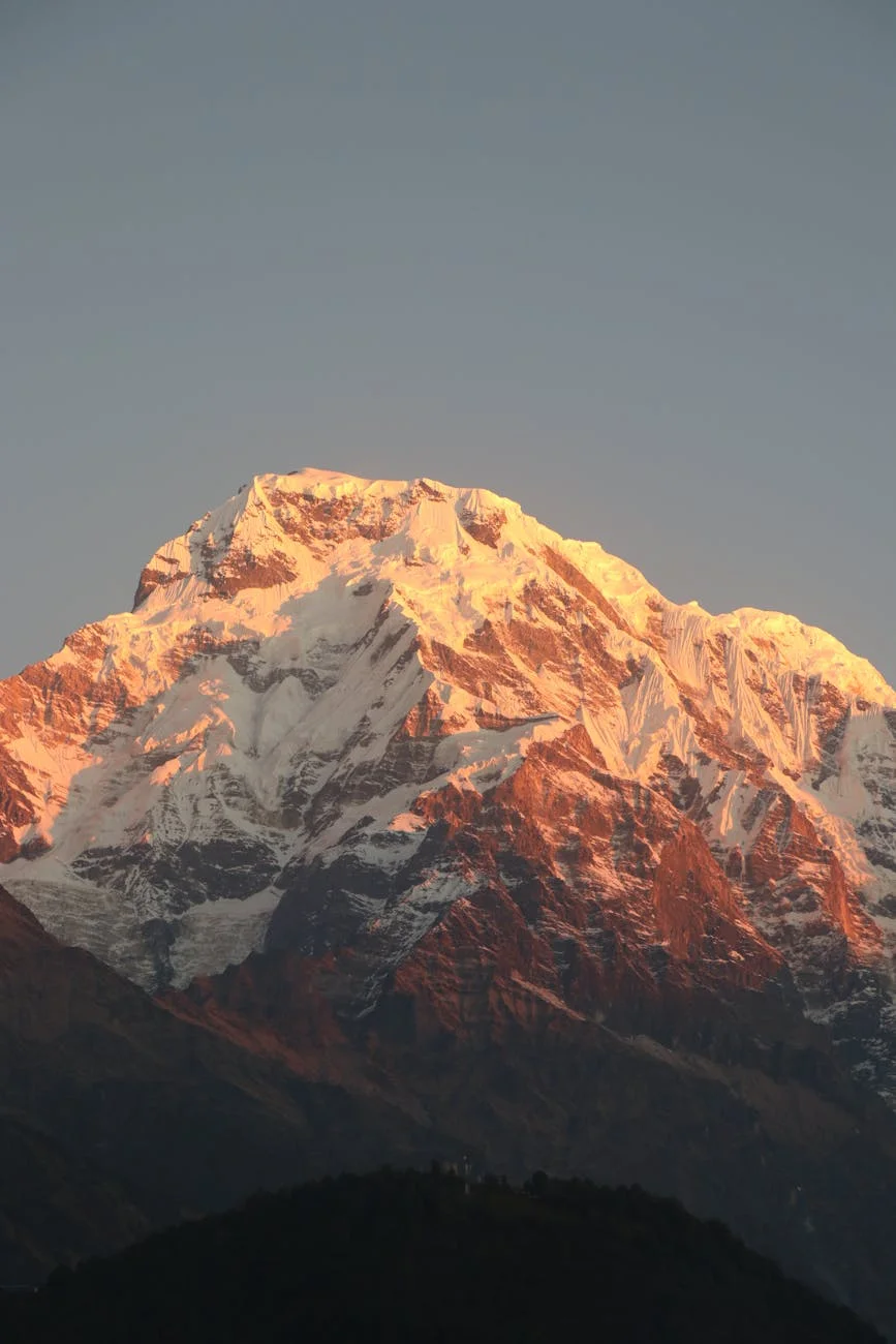 Majestic Himalayan Peak Bathed in Golden Sunrise