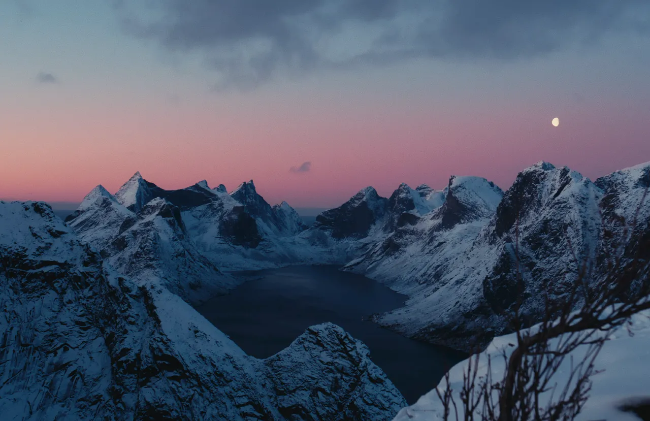 Breathtaking Arctic Fjord Sunset with Crescent Moon