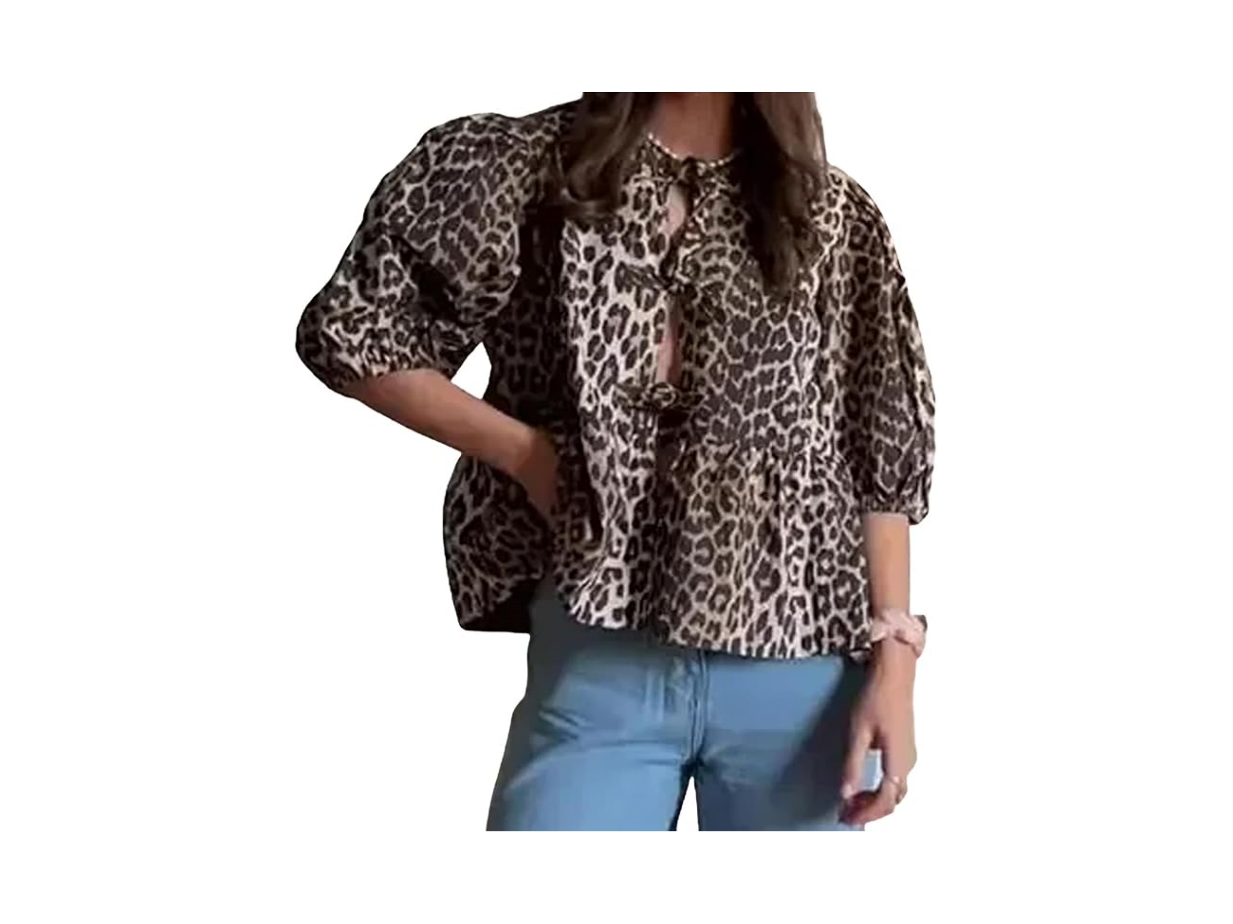 Daring and Stylish: Leopard-Print Peplum Top Paired with Jeans and Heels