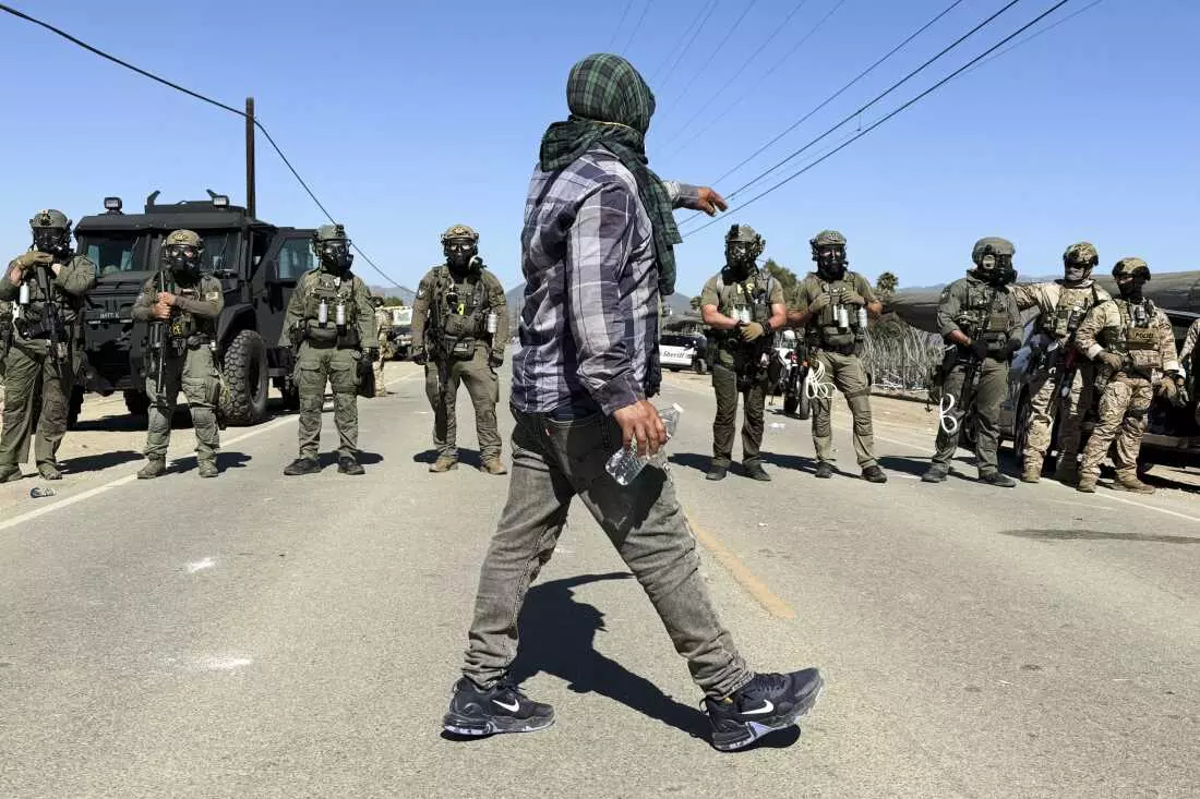 Federal Agents and Protesters Clash During Farm Raid in Southern California